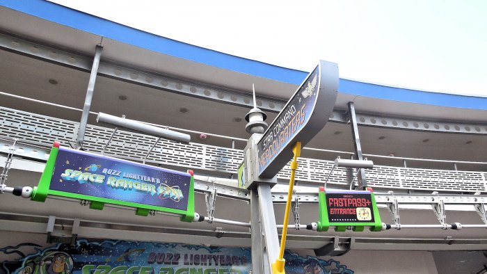 A photo of Buzz Lightyear's Space Ranger Spin Logo and Sign
